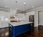 Custom Blue painted island in Brookhaven home built by Atlanta Homebuilder, Waterford Homes